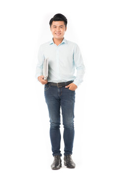 Portrait of adult Asian student holding books
