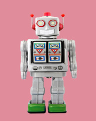 retro robot toy smiling pink background