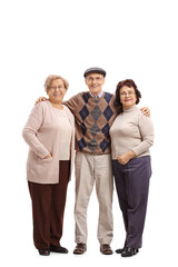 Elderly man with two elderly women looking at the camera and smiling