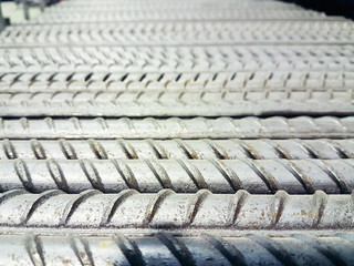 stack of ribbed steel bars for construction. perspective view