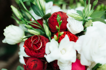 Wedding bouquet with roses and other flowers