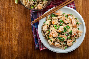 Fried rice with shrimp and vegetables served on a plate