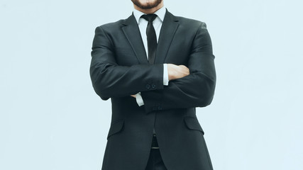 Obraz na płótnie Canvas successful businessman in a stylish black business suit on white