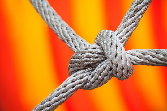 Close-up Of Rope Knot Line Tied Together With Playground Background.selective Focus.