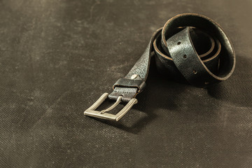 Rolled fashionable men's black leather belt