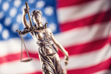 Lady Justice and American flag. Symbol of law and justice with USA Flag