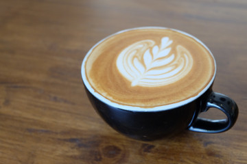 hot latte on table for working day