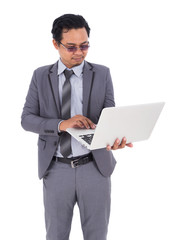 business man holding laptop isolated on white background