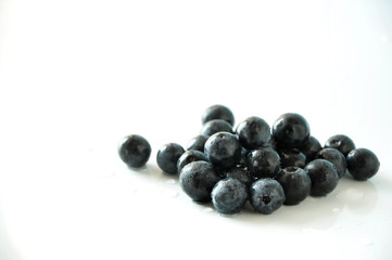 Fresh Blueberries on White Background with Copyspace
