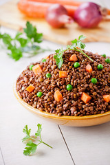 Bowl Of Lentils With Carrot And Peas