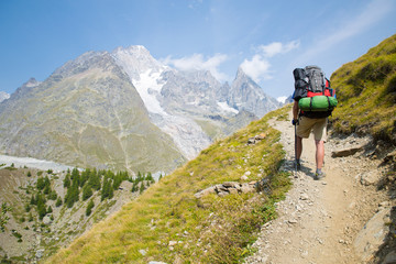 expedition to mountains with a tent and solar batteries

