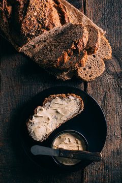 Close up of bread and butter served on plate