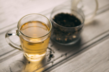 Mug of green tea and dry tea