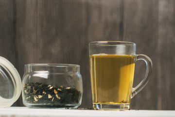 Mug of green tea and dry tea