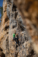  rock-climber climbs route with lower insurance
