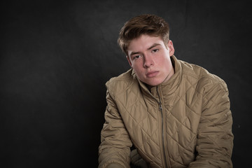 Fototapeta premium Serious teenage boy
