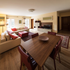 Detail of chairs and table in living room