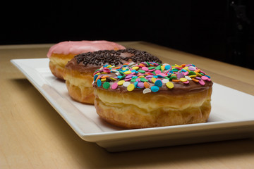 fresh donuts on a plate