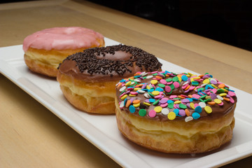 fresh donuts on a plate
