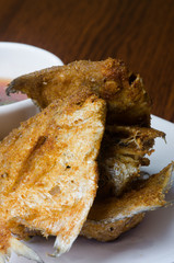 japanese cuisine. fried fish on the background