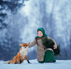 little girl with Fox in the woods