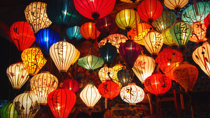 typical colourful lanterns at tourist shop in Hoi An, Vietnam - obrazy, fototapety, plakaty