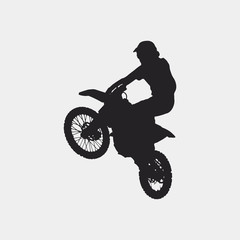 Fototapeta na wymiar Motocross driver jump silhouette