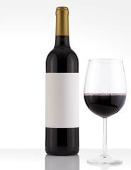 Isolated Red Wine Bottle in a White Background and White Label and Glass