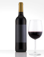 Isolated Red Wine Bottle in a White Background and Black Label