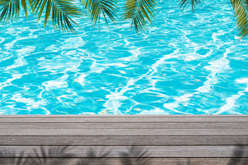 Obraz premium poolside under palm leaves background