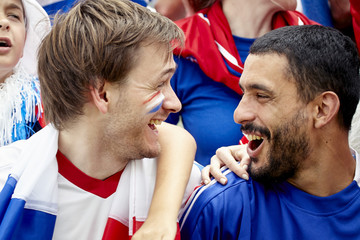 French football fans enjoying match