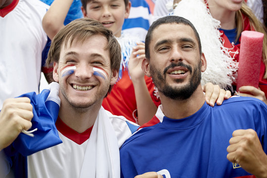 French football supporters at match, portrait