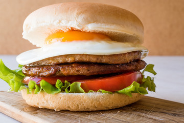 Homemade Double Hamburger with Egg, Lettuce and Tomatoes.