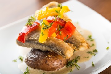 Grilled Sardines Plate with Potatoes Decorated by Pepper