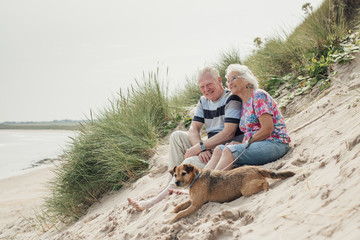 Fototapeta premium Couple Relaxing on the Beach