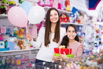 Happy people in toys store