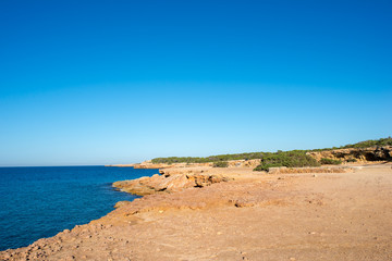Fototapeta na wymiar Transparent waters in the cala compte, Ibiza
