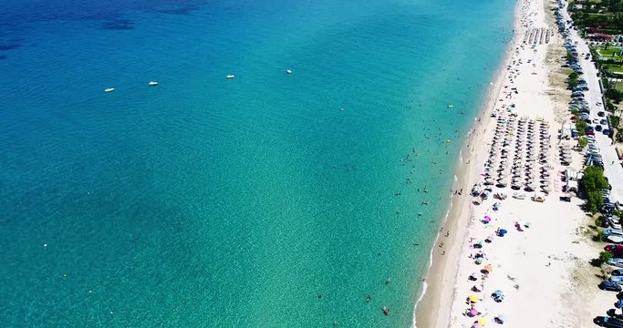 Aerial flight with drone over the of Aigeopelagitika beach in Kassandra, Chalkidiki, Greece