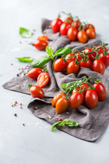 Assortment of ripe organic farmer red tomatoes on a table