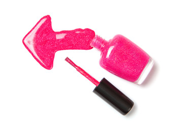 Nail polish pink in left arrow shape on white isolated background