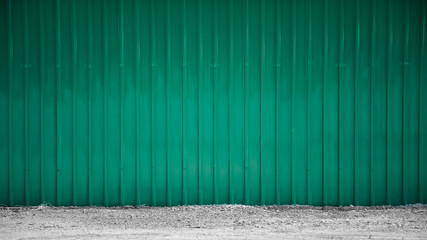 green corrugated metal wall