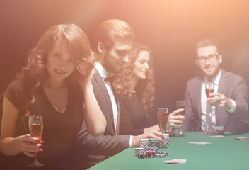 successful young people spend the night at the casino