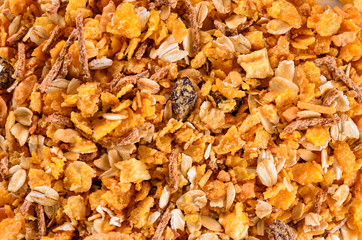 Breakfast: Texture of matinals cereals, flakes and grains, healthy food background.