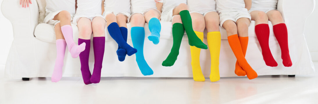 Kids With Colorful Socks. Children Footwear.