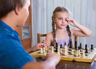 Obraz na płótnie Canvas children at chess board indoors