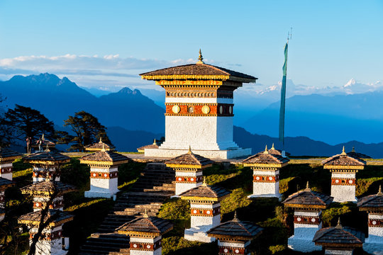 Sunset on Dochula Pass with Himalaya in background - Bhutan. In this pass, 108 memorial chortens or stupas known as Druk Wangyal Chortens have been built by Ashi Dorji Wangmo Wangchuk.
