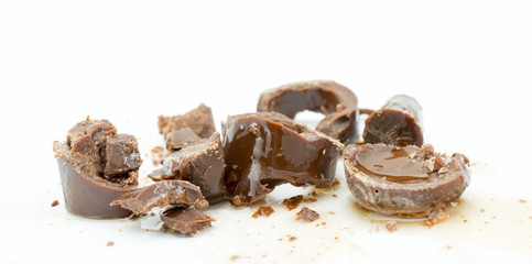 Candy with sweet cherry,chocolate and syrup liquors on a white background.