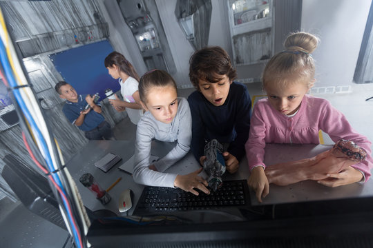  children play in the quest room of a inscrutable bunker