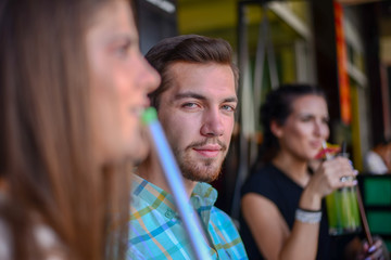 Frends hanging out and smooking hookah