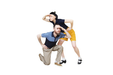 Dancers are looking for something. Boogie or lindy hop in a studio background. Dance for rock-n-roll music.
